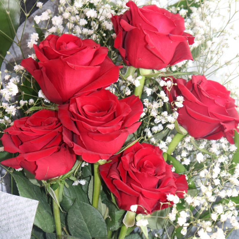 A premium presentation bouquet filled with rich red roses, designed to convey timeless love and passion.