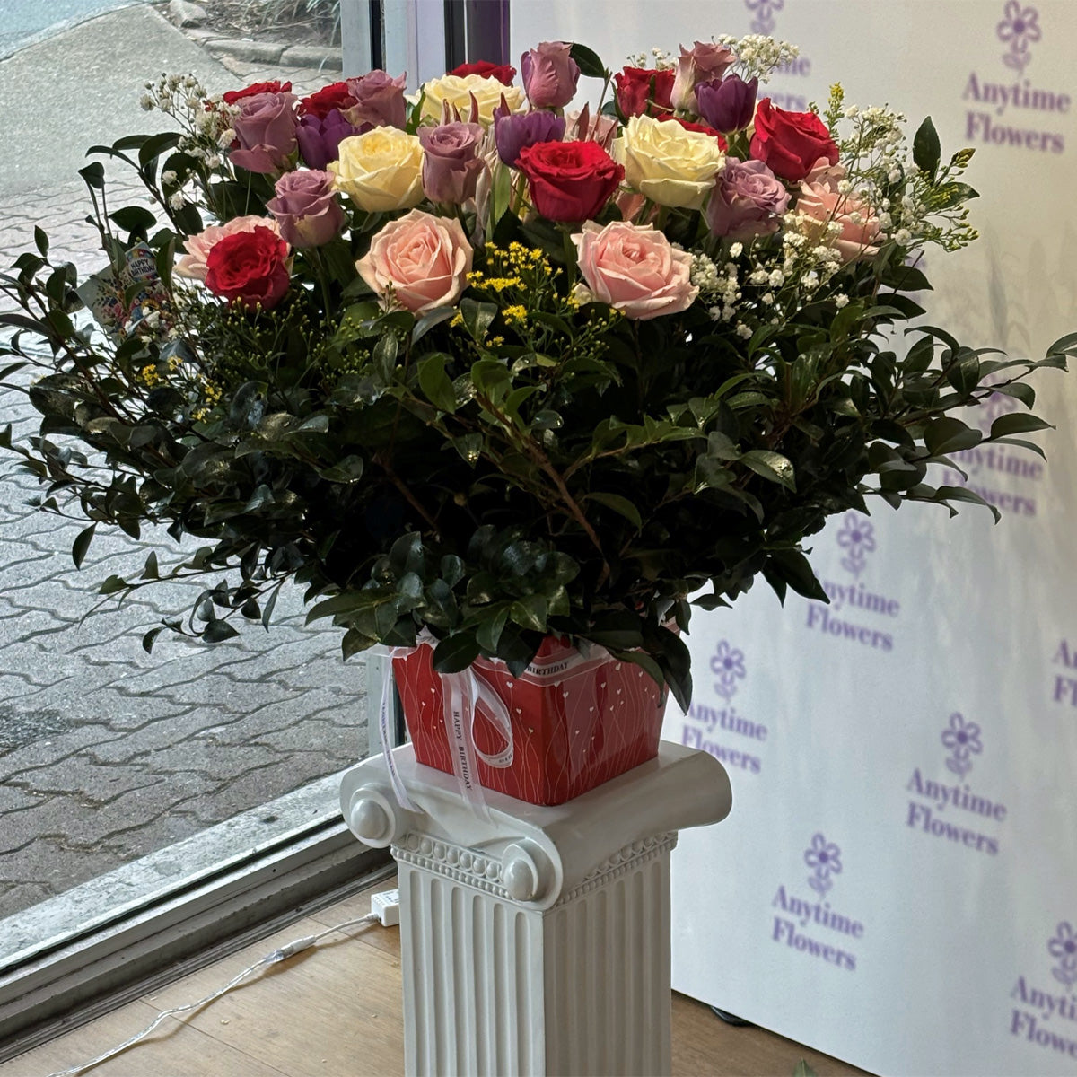 Box arrangement of roses