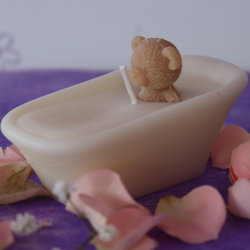 Teddy bear in a bath candle with rose scent