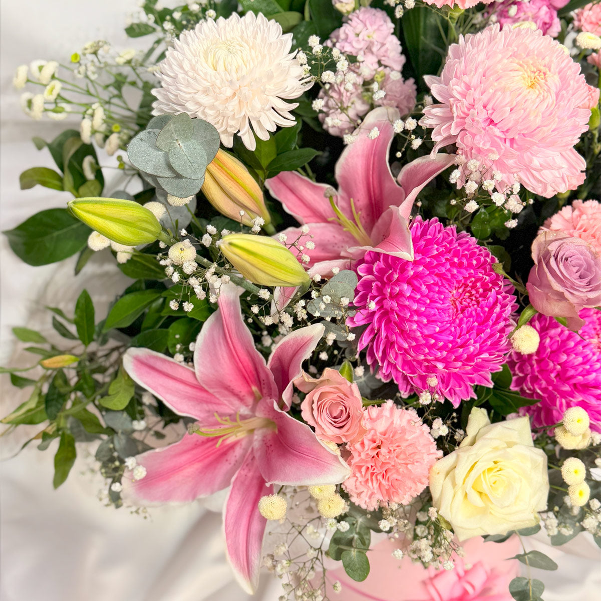 Pink lilies and other flowers