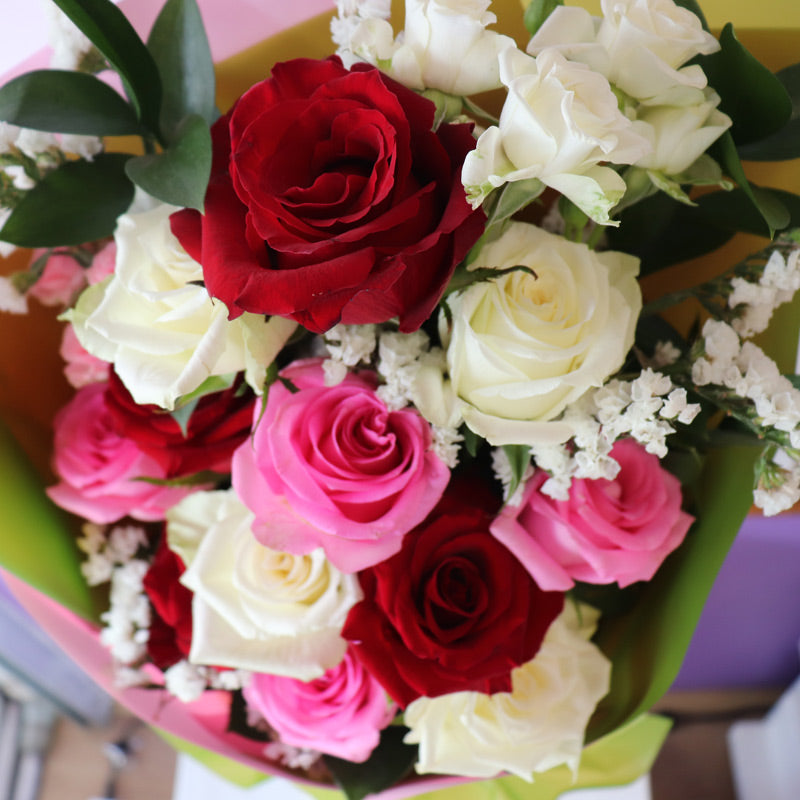A stylish bouquet filled with vibrant red roses, an ideal gift to express love and passion.