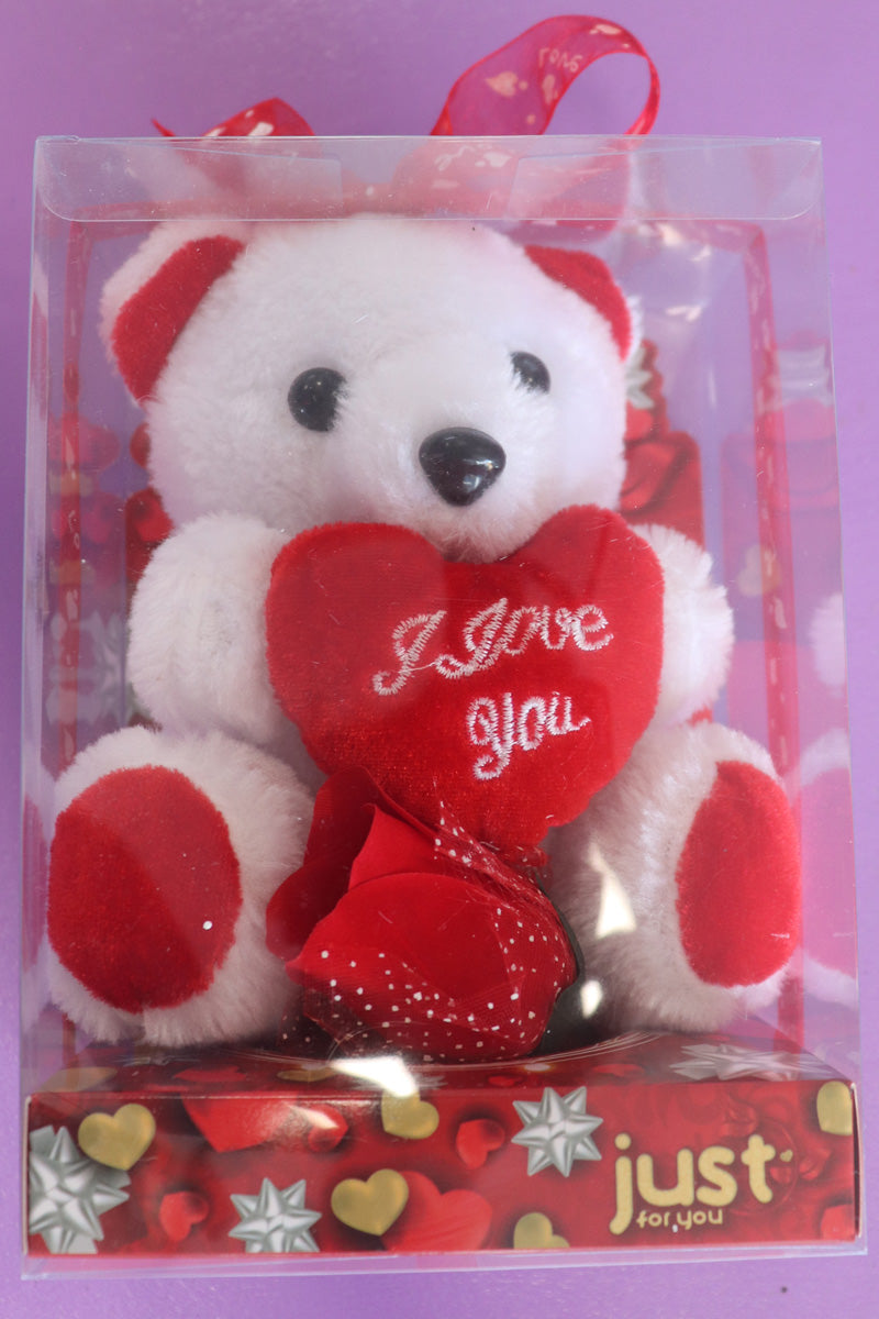 A plush teddy bear elegantly gift-boxed, perfect for adding a cute and cuddly touch to any flower arrangement.