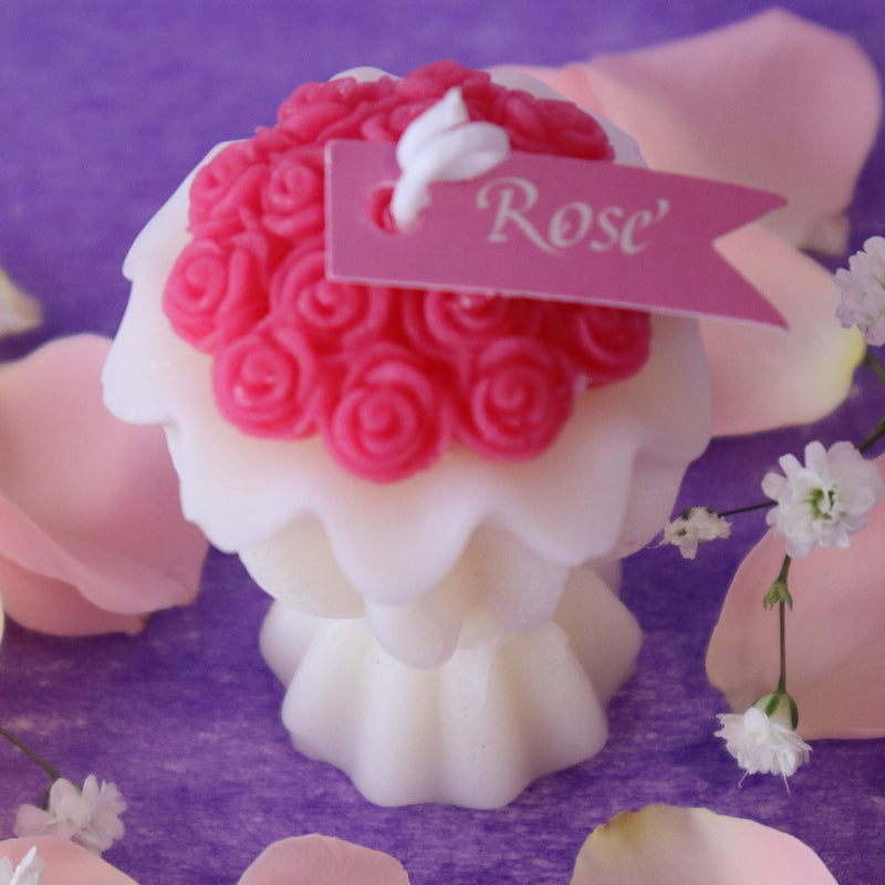 Scented candle depicting a bouquet of roses