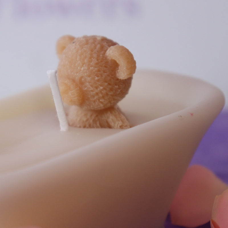 Teddy bear in a bath candle with rose scent